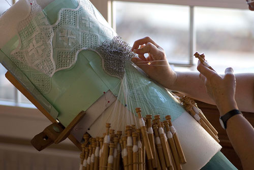 Close-up on Lace Making Look at all those pins and bolillos